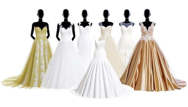 Mannequins displaying seven elegant bridal gowns in various designs and colors.