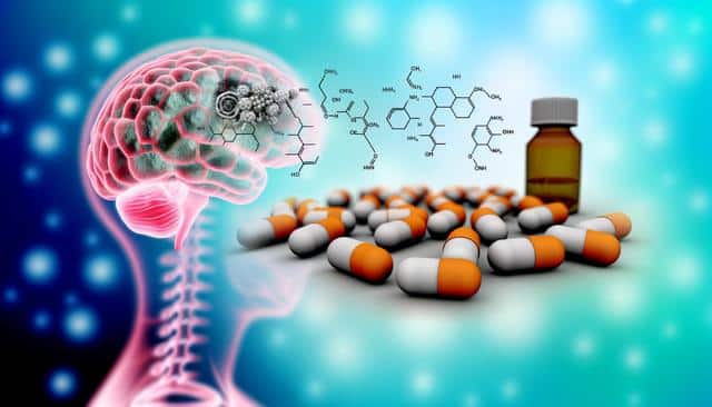 Illustration of a brain, chemical formulas, orange-white capsules, and a medicine bottle on a blurred background.